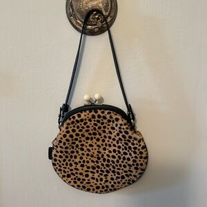 Agnes B leopard pattern, textured small purse.